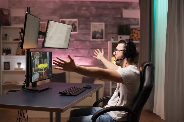 Excited gamer celebrating success in Roblox game development