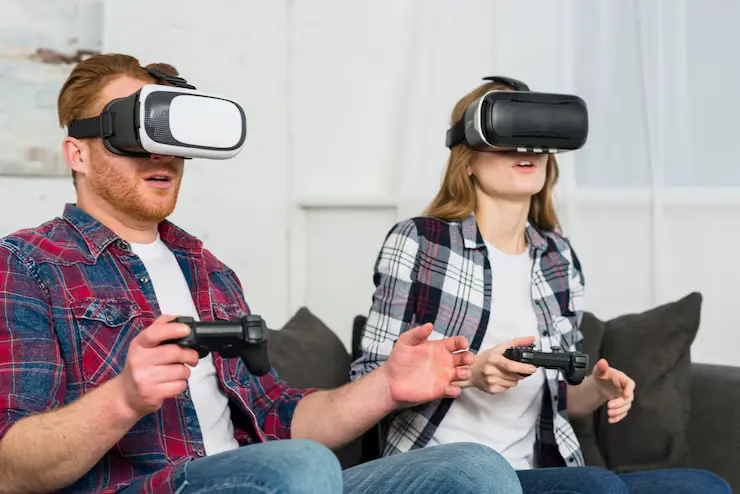 Multiplayer Game Development Multiplayer Game Development Agency testing VR gameplay with controllers in a home setup
