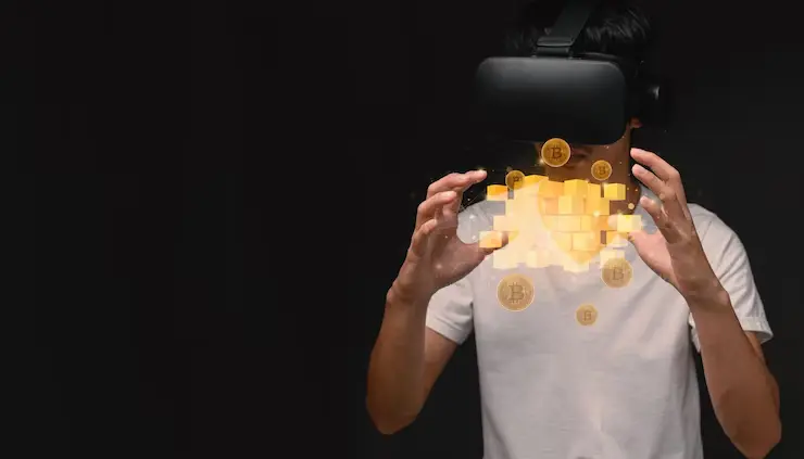 Developer using VR headset for metaverse game development with floating golden cryptocurrency coins