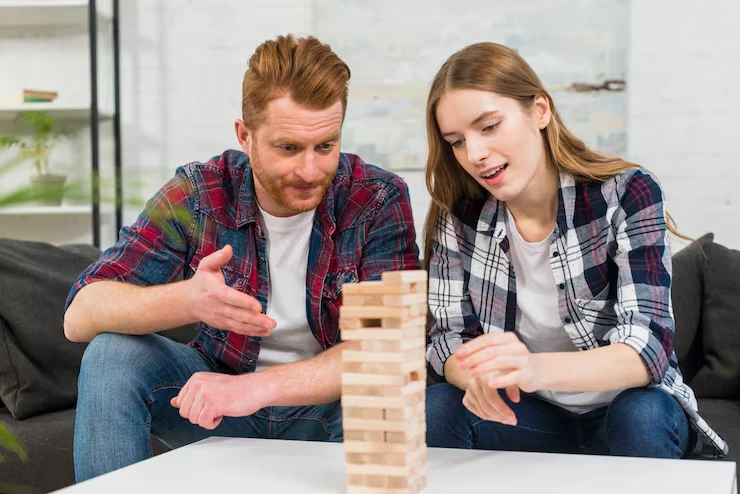 Rulebook Writing and Game Balancing