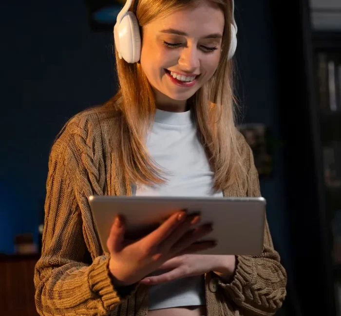 User enjoying a mobile game on an iPad, illustrating the engaging experience of mobile game development.