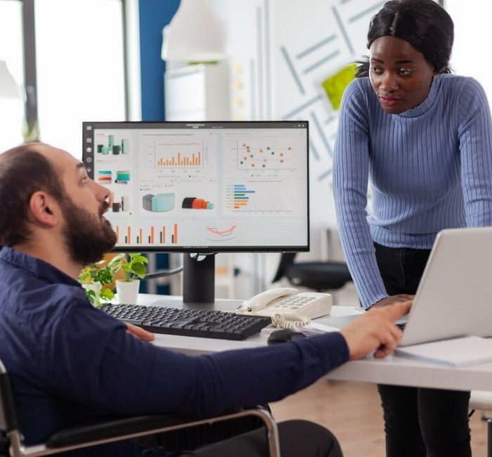 Professional man showing market insights of games to his colleague