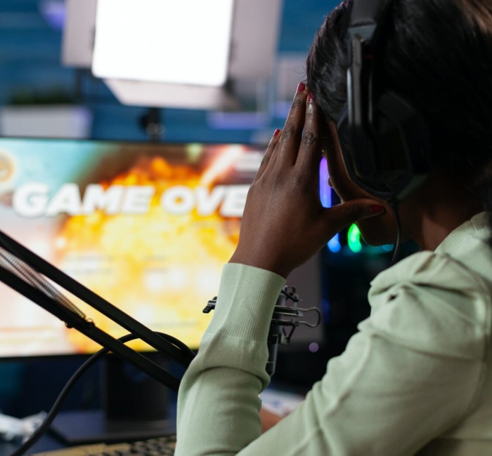 African american woman gamer losing online videogames