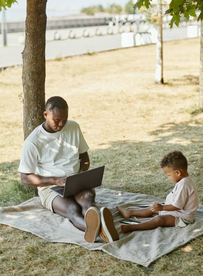 Father Working in Park with Son, Buildbox Game Development Services