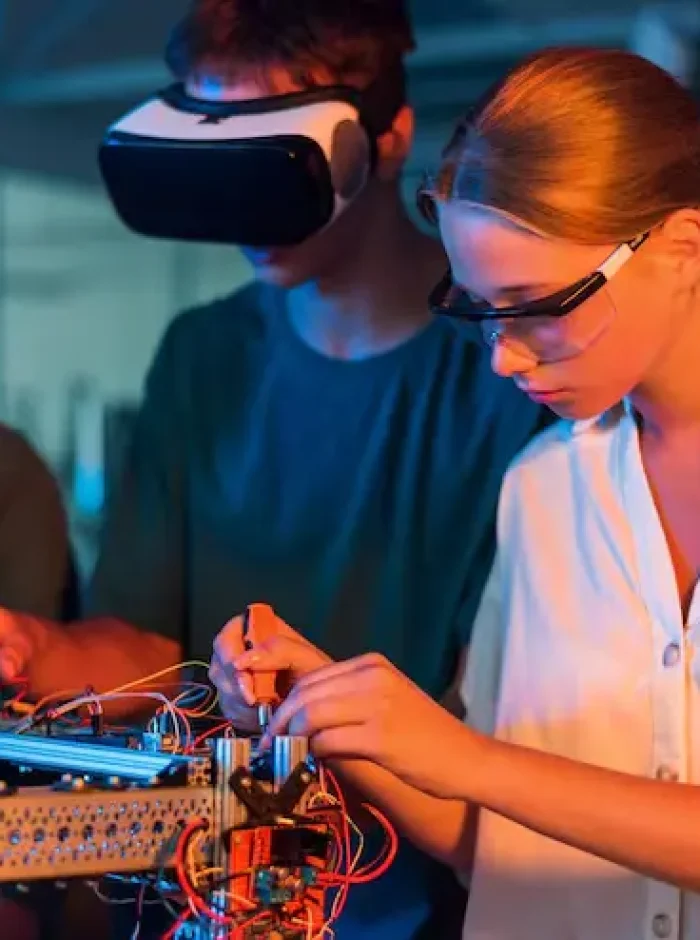 group-teens-doing-experiments-robotics-laboratory-boy-girls-protective-vr_1268-23740 group-teens-doing-experiments-robotics-laboratory-boy-girls-protective-vr_1268-23740