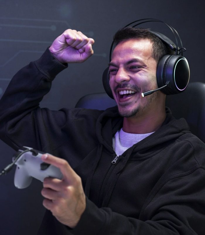 Professional eSport gamer playing a game with gaming controller