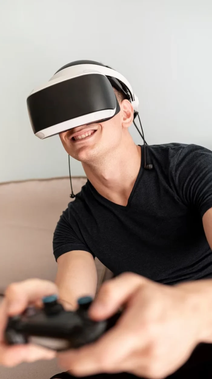 Teenager playing VR game developed by professional VR Game Development Agency