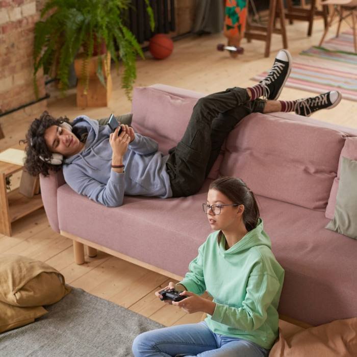 Teenagers playing gadgets