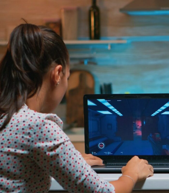 Shooter game development agency testing gameplay with remote players