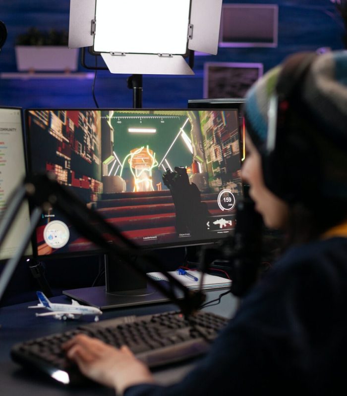 Engaged gamer streaming a retro-style Graphic Adventure Game Development title