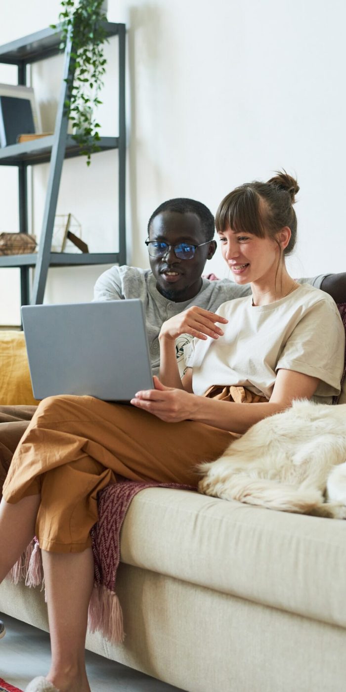 Couple engaging with mobile games supported by mobile game marketing agency.